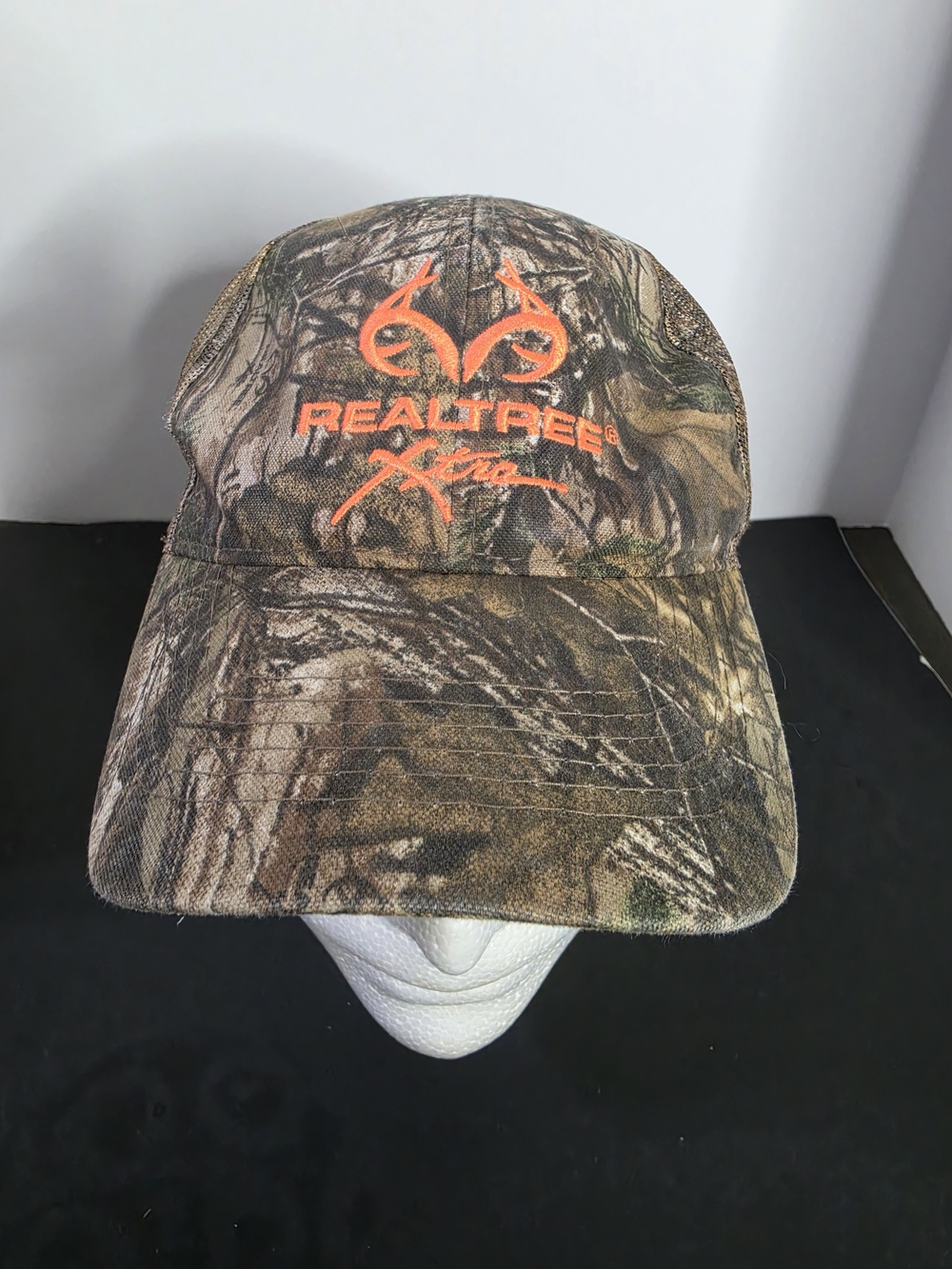 Realtree Xtra Camouflage Hunting Cap with Orange Logo